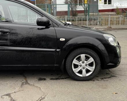 Чорний Кіа Ріо, об'ємом двигуна 1.4 л та пробігом 151 тис. км за 6490 $, фото 8 на Automoto.ua