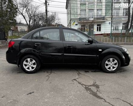 Чорний Кіа Ріо, об'ємом двигуна 1.4 л та пробігом 151 тис. км за 6490 $, фото 9 на Automoto.ua