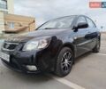 Черный Киа Рио, объемом двигателя 1.5 л и пробегом 155 тыс. км за 5650 $, фото 1 на Automoto.ua