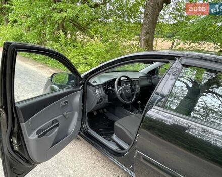 Черный Киа Рио, объемом двигателя 1.4 л и пробегом 91 тыс. км за 4500 $, фото 5 на Automoto.ua