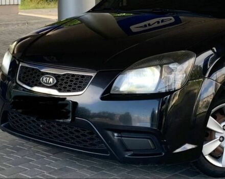 Чорний Кіа Ріо, об'ємом двигуна 1.4 л та пробігом 204 тис. км за 4600 $, фото 2 на Automoto.ua