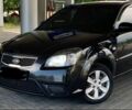 Чорний Кіа Ріо, об'ємом двигуна 1.4 л та пробігом 204 тис. км за 4600 $, фото 3 на Automoto.ua