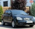 Черный Киа Рио, объемом двигателя 1.4 л и пробегом 151 тыс. км за 4500 $, фото 10 на Automoto.ua