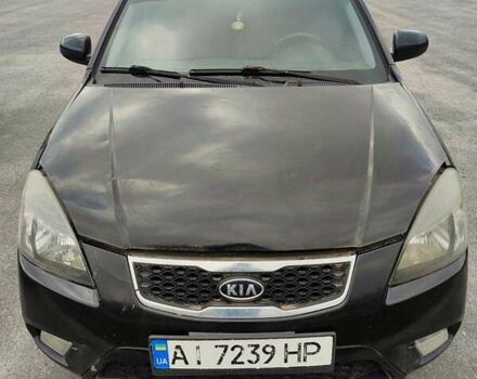 Чорний Кіа Ріо, об'ємом двигуна 1.4 л та пробігом 253 тис. км за 4000 $, фото 1 на Automoto.ua