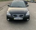 Чорний Кіа Ріо, об'ємом двигуна 1.4 л та пробігом 189 тис. км за 5463 $, фото 1 на Automoto.ua