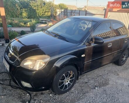 Чорний Кіа Ріо, об'ємом двигуна 1.4 л та пробігом 210 тис. км за 4700 $, фото 23 на Automoto.ua