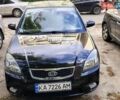 Черный Киа Рио, объемом двигателя 1.4 л и пробегом 325 тыс. км за 5250 $, фото 1 на Automoto.ua