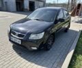Черный Киа Рио, объемом двигателя 1.4 л и пробегом 290 тыс. км за 4500 $, фото 1 на Automoto.ua