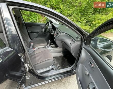 Черный Киа Рио, объемом двигателя 1.4 л и пробегом 91 тыс. км за 4800 $, фото 21 на Automoto.ua