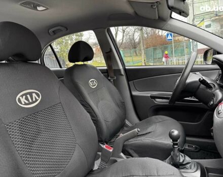 Чорний Кіа Ріо, об'ємом двигуна 1.4 л та пробігом 151 тис. км за 6490 $, фото 37 на Automoto.ua