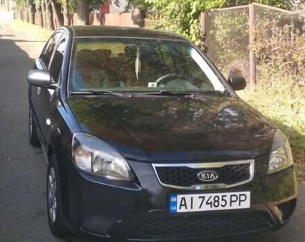 Чорний Кіа Ріо, об'ємом двигуна 1.4 л та пробігом 248 тис. км за 4650 $, фото 5 на Automoto.ua