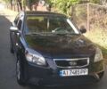 Чорний Кіа Ріо, об'ємом двигуна 1.4 л та пробігом 248 тис. км за 4650 $, фото 5 на Automoto.ua