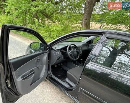 Черный Киа Рио, объемом двигателя 1.4 л и пробегом 91 тыс. км за 4800 $, фото 5 на Automoto.ua