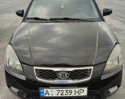 Черный Киа Рио, объемом двигателя 1.4 л и пробегом 253 тыс. км за 4000 $, фото 1 на Automoto.ua