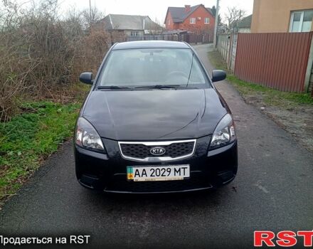 Черный Киа Рио, объемом двигателя 1.4 л и пробегом 186 тыс. км за 4800 $, фото 2 на Automoto.ua