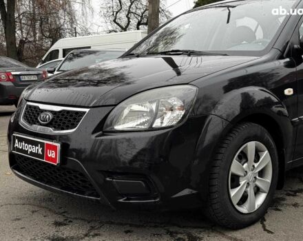 Чорний Кіа Ріо, об'ємом двигуна 1.4 л та пробігом 151 тис. км за 6490 $, фото 2 на Automoto.ua