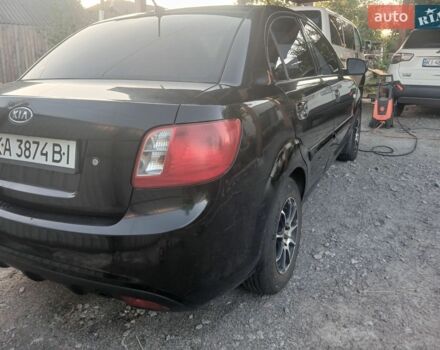 Чорний Кіа Ріо, об'ємом двигуна 1.4 л та пробігом 210 тис. км за 4700 $, фото 9 на Automoto.ua