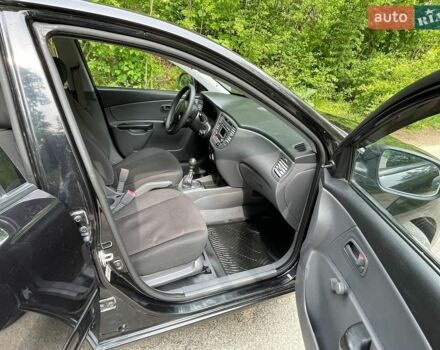 Чорний Кіа Ріо, об'ємом двигуна 1.4 л та пробігом 91 тис. км за 4500 $, фото 21 на Automoto.ua