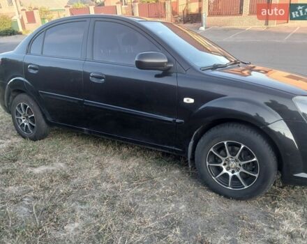Чорний Кіа Ріо, об'ємом двигуна 1.4 л та пробігом 210 тис. км за 4700 $, фото 7 на Automoto.ua
