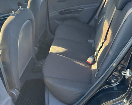 Чорний Кіа Ріо, об'ємом двигуна 1.5 л та пробігом 154 тис. км за 6900 $, фото 29 на Automoto.ua