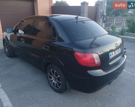 Чорний Кіа Ріо, об'ємом двигуна 1.4 л та пробігом 210 тис. км за 4700 $, фото 3 на Automoto.ua