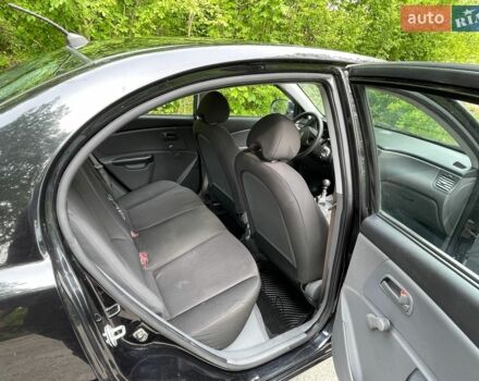 Черный Киа Рио, объемом двигателя 1.4 л и пробегом 91 тыс. км за 4500 $, фото 12 на Automoto.ua