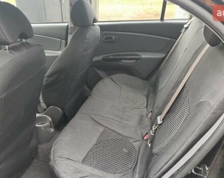 Черный Киа Рио, объемом двигателя 1.4 л и пробегом 150 тыс. км за 6000 $, фото 7 на Automoto.ua