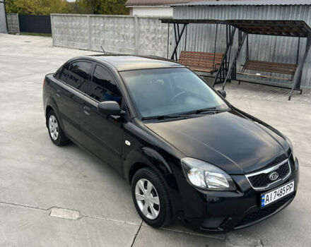 Кіа Ріо 2010 у Белой Церкве на Automoto.ua Чорний Кіа Ріо, об'ємом двигуна 1.4 л та пробігом 248 тис. км за 4250 $, фото 4 на Automoto.ua