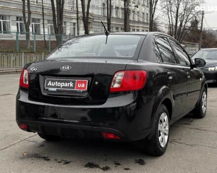 Чорний Кіа Ріо, об'ємом двигуна 1.4 л та пробігом 151 тис. км за 6490 $, фото 12 на Automoto.ua