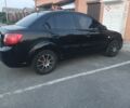 Чорний Кіа Ріо, об'ємом двигуна 1.4 л та пробігом 210 тис. км за 4308 $, фото 6 на Automoto.ua