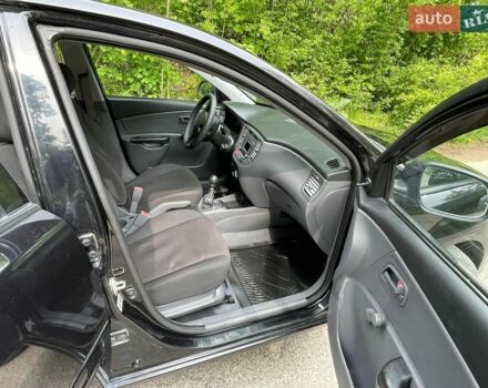 Черный Киа Рио, объемом двигателя 1.4 л и пробегом 91 тыс. км за 4500 $, фото 21 на Automoto.ua