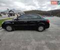 Черный Киа Рио, объемом двигателя 1.4 л и пробегом 253 тыс. км за 4000 $, фото 1 на Automoto.ua