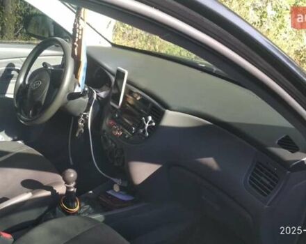 Чорний Кіа Ріо, об'ємом двигуна 1.4 л та пробігом 248 тис. км за 4650 $, фото 4 на Automoto.ua