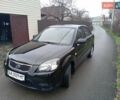 Черный Киа Рио, объемом двигателя 1.4 л и пробегом 186 тыс. км за 4800 $, фото 1 на Automoto.ua