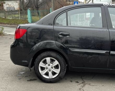 Чорний Кіа Ріо, об'ємом двигуна 1.4 л та пробігом 151 тис. км за 6490 $, фото 10 на Automoto.ua