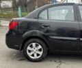 Чорний Кіа Ріо, об'ємом двигуна 1.4 л та пробігом 151 тис. км за 6490 $, фото 10 на Automoto.ua