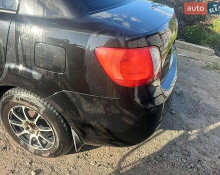 Чорний Кіа Ріо, об'ємом двигуна 1.4 л та пробігом 210 тис. км за 4700 $, фото 22 на Automoto.ua