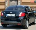 Черный Киа Рио, объемом двигателя 1.4 л и пробегом 151 тыс. км за 4500 $, фото 24 на Automoto.ua