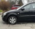 Чорний Кіа Ріо, об'ємом двигуна 1.4 л та пробігом 151 тис. км за 6490 $, фото 19 на Automoto.ua