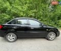 Черный Киа Рио, объемом двигателя 1.4 л и пробегом 91 тыс. км за 4800 $, фото 2 на Automoto.ua