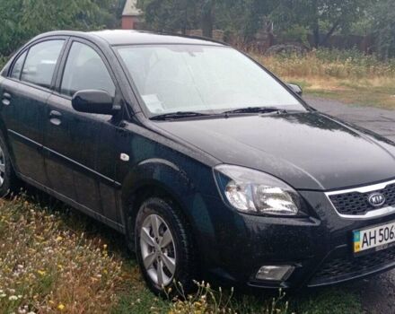 Чорний Кіа Ріо, об'ємом двигуна 1.4 л та пробігом 32 тис. км за 6500 $, фото 4 на Automoto.ua