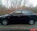 Черный Киа Рио, объемом двигателя 1.4 л и пробегом 186 тыс. км за 4800 $, фото 1 на Automoto.ua