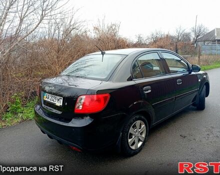 Чорний Кіа Ріо, об'ємом двигуна 1.4 л та пробігом 186 тис. км за 4800 $, фото 5 на Automoto.ua