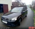 Чорний Кіа Ріо, об'ємом двигуна 1.4 л та пробігом 186 тис. км за 4800 $, фото 1 на Automoto.ua