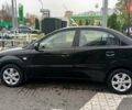 Черный Киа Рио, объемом двигателя 1.4 л и пробегом 150 тыс. км за 6000 $, фото 4 на Automoto.ua