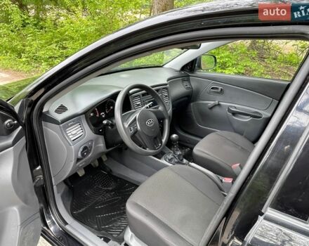 Черный Киа Рио, объемом двигателя 1.4 л и пробегом 91 тыс. км за 4500 $, фото 9 на Automoto.ua