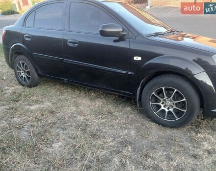 Чорний Кіа Ріо, об'ємом двигуна 1.4 л та пробігом 210 тис. км за 4700 $, фото 8 на Automoto.ua