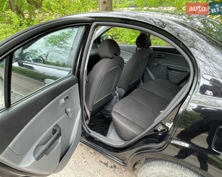 Черный Киа Рио, объемом двигателя 1.4 л и пробегом 91 тыс. км за 4500 $, фото 6 на Automoto.ua