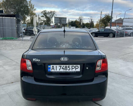 Кіа Ріо 2010 у Белой Церкве на Automoto.ua Чорний Кіа Ріо, об'ємом двигуна 1.4 л та пробігом 248 тис. км за 4250 $, фото 8 на Automoto.ua