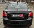 Чорний Кіа Ріо, об'ємом двигуна 1.4 л та пробігом 151 тис. км за 6490 $, фото 14 на Automoto.ua